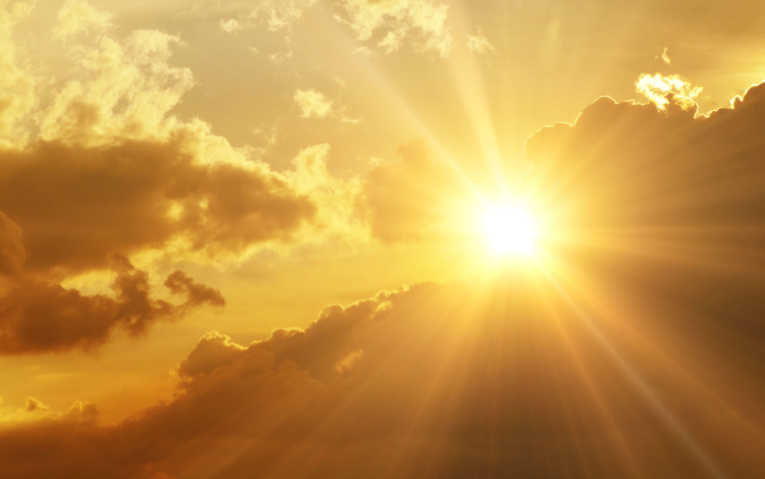 The bright sun in the sky