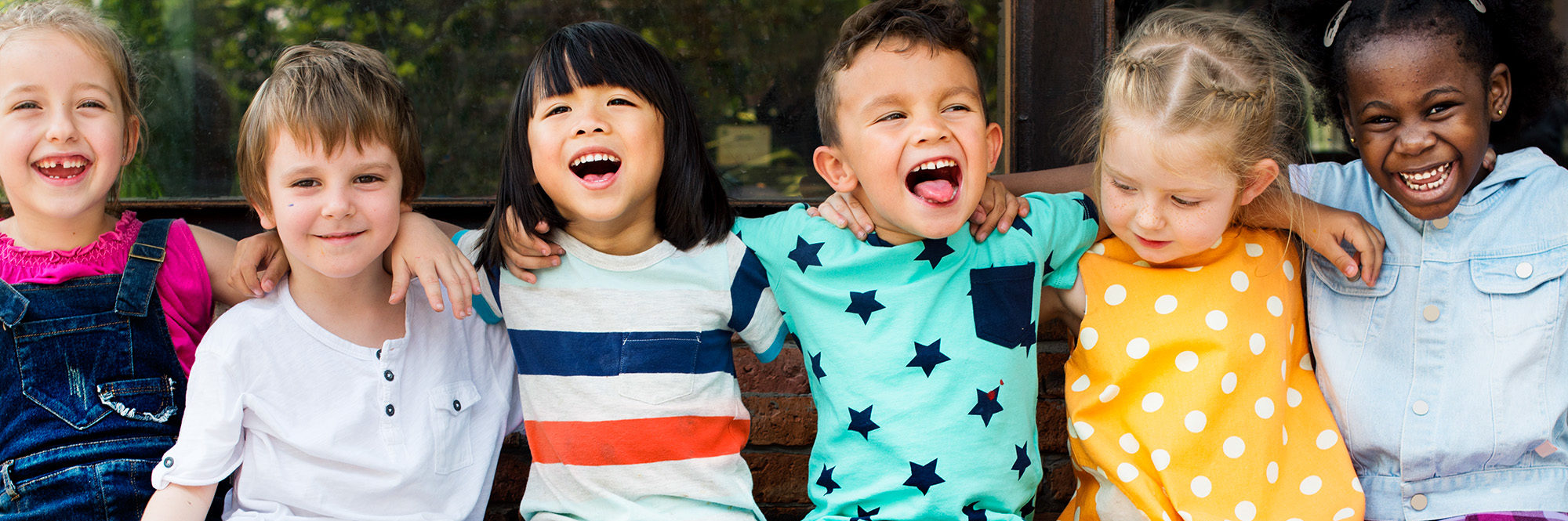 A group of photo of smiling and laughing toddlers
